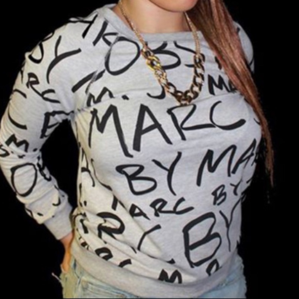 Cute MJ sweater.
